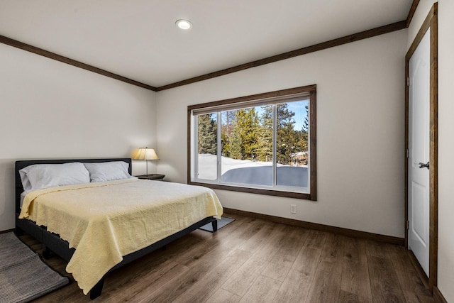 4475 Star Meadows Rd, Whitefish, MT 59937 - bedroom with wood finished floors, crown molding, and recessed lighting
