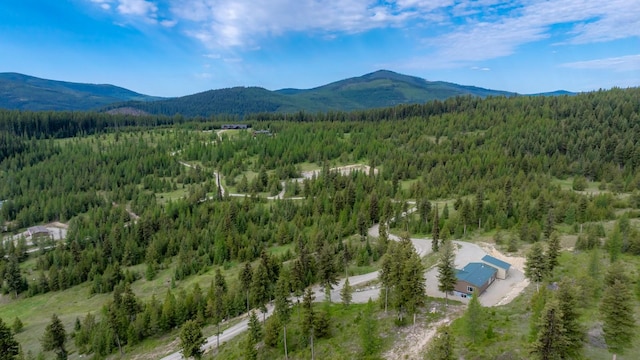 4475 Star Meadows Rd, Whitefish, MT 59937 - aerial view of a forest and a mountainous background