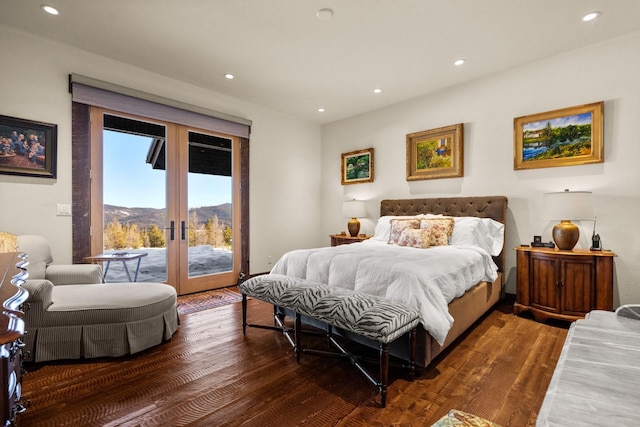 4475 Star Meadows Rd, Whitefish, MT 59937 - bedroom featuring access to outside, french doors, a mountain view, dark wood-style floors, and recessed lighting