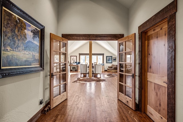 4475 Star Meadows Rd, Whitefish, MT 59937 - hall with dark wood-style floors, french doors, and high vaulted ceiling