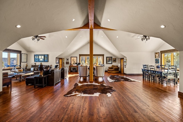 4475 Star Meadows Rd, Whitefish, MT 59937 - living area featuring ceiling fan, lofted ceiling, wood finished floors, plenty of natural light, and recessed lighting