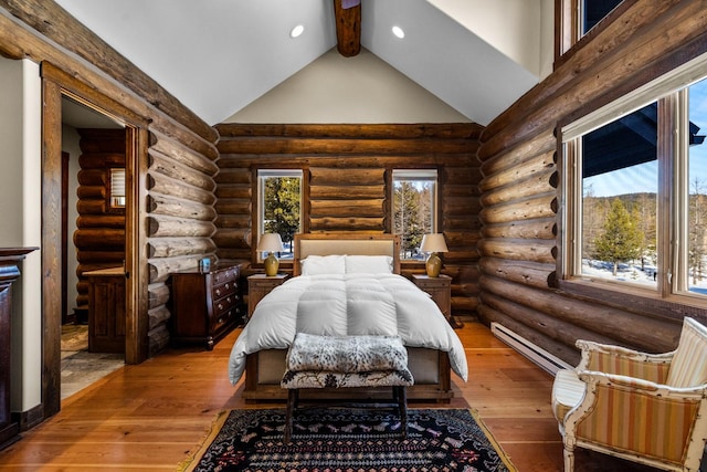 4475 Star Meadows Rd, Whitefish, MT 59937 - bedroom with high vaulted ceiling, hardwood / wood-style flooring, recessed lighting, beam ceiling, and rustic walls