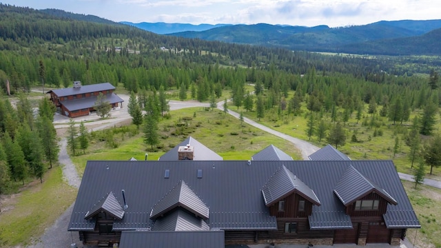 4475 Star Meadows Rd, Whitefish, MT 59937 - aerial view of property and surrounding area featuring a forest and a mountain backdrop
