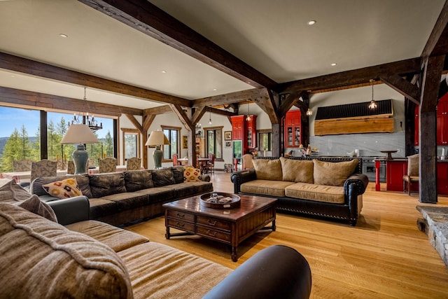 4475 Star Meadows Rd, Whitefish, MT 59937 - living room with wood finished floors, beamed ceiling, recessed lighting, and a chandelier