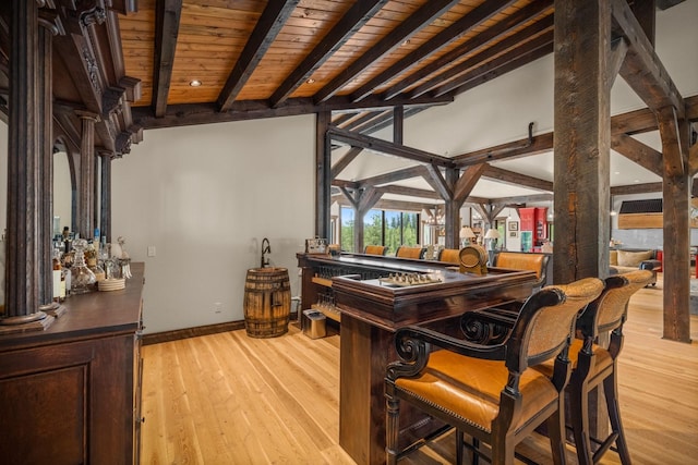 4475 Star Meadows Rd, Whitefish, MT 59937 - indoor dry bar with wood finished floors and a wood ceiling with exposed beams