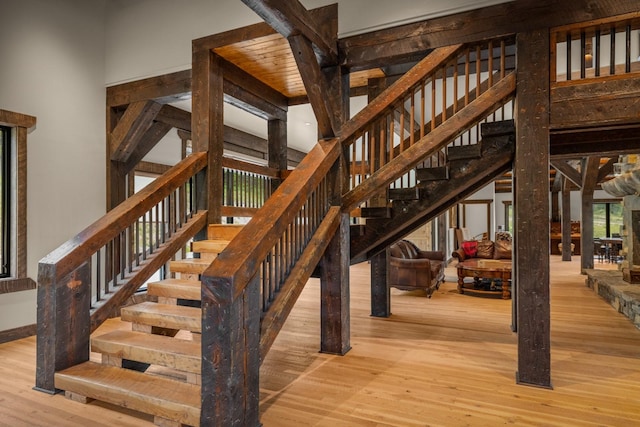 4475 Star Meadows Rd, Whitefish, MT 59937 - staircase featuring wood finished floors and baseboards