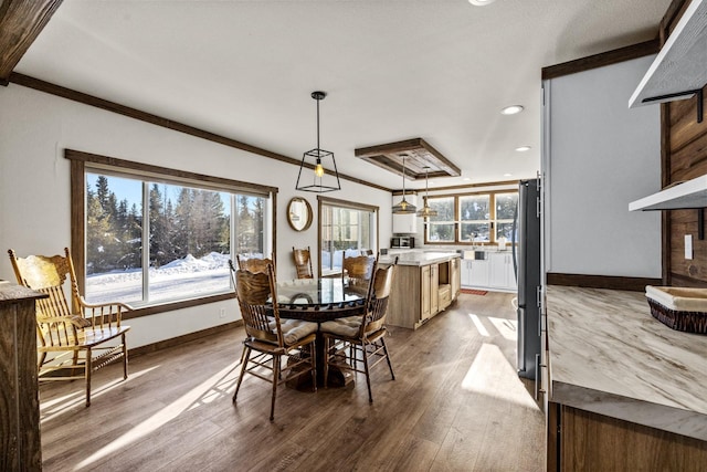4475 Star Meadows Rd, Whitefish, MT 59937 - dining space featuring plenty of natural light, wood finished floors, recessed lighting, and ornamental molding