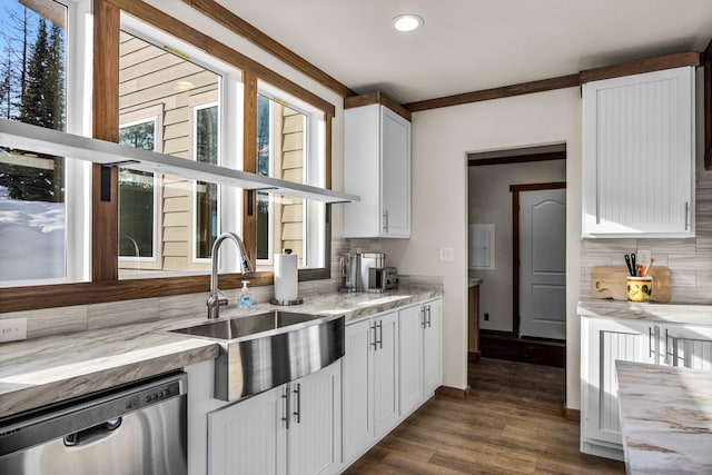 4475 Star Meadows Rd, Whitefish, MT 59937 - kitchen featuring stainless steel dishwasher, decorative backsplash, recessed lighting, dark wood-type flooring, and white cabinetry