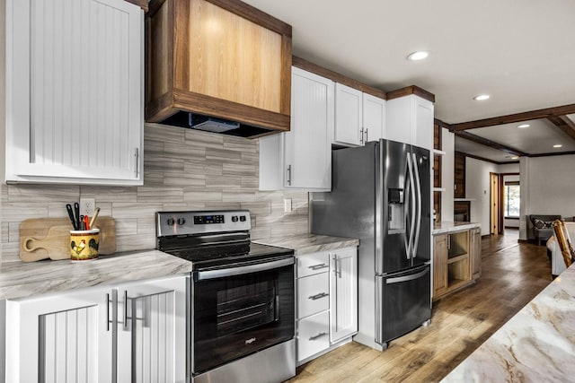 4475 Star Meadows Rd, Whitefish, MT 59937 - kitchen with stainless steel appliances, premium range hood, light wood-style floors, light stone counters, and recessed lighting