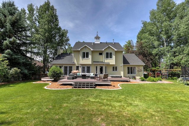108 Apple House Ln, Missoula, MT 59802 - rear view of house with an outdoor hangout area, a wooden deck, a lawn, and french doors