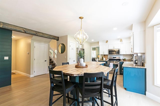 108 Apple House Ln, Missoula, MT 59802 - dining room featuring stairway, a chandelier, light wood finished floors, and recessed lighting