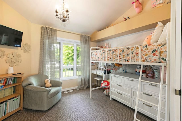 108 Apple House Ln, Missoula, MT 59802 - carpeted bedroom with vaulted ceiling and a chandelier
