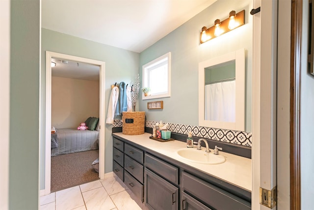 108 Apple House Ln, Missoula, MT 59802 - ensuite bathroom with vanity and marble finish flooring