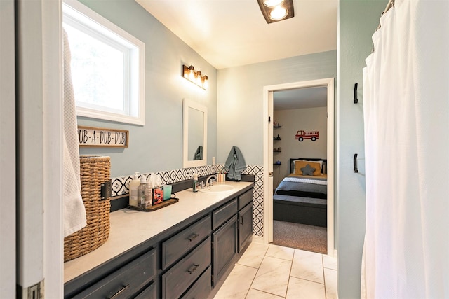 108 Apple House Ln, Missoula, MT 59802 - full bath featuring vanity, marble finish flooring, ensuite bathroom, and a shower with curtain