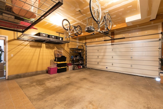 108 Apple House Ln, Missoula, MT 59802 - garage featuring a garage door opener