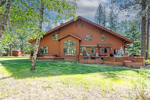 4037 Wakantanka Way, Stevensville, MT 59870 - rear view of property featuring a lawn, a deck, and a chimney