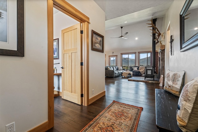 559 Stage Springs Ln, Stevensville, MT 59870 - corridor featuring dark wood-style floors and lofted ceiling
