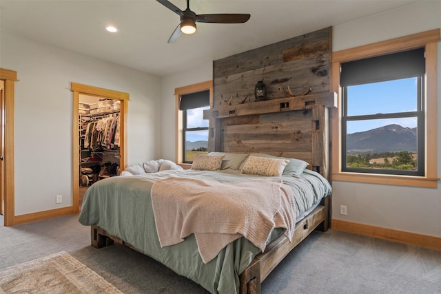 559 Stage Springs Ln, Stevensville, MT 59870 - carpeted bedroom featuring a walk in closet, a closet, recessed lighting, and a ceiling fan