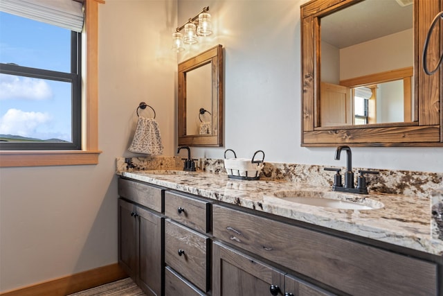 559 Stage Springs Ln, Stevensville, MT 59870 - bathroom featuring double vanity and healthy amount of natural light