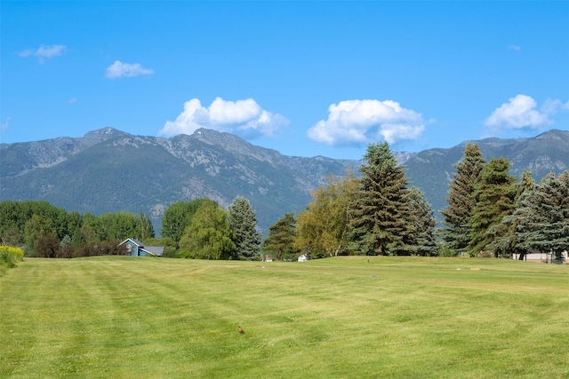 46452 Stagecoach Trl, Ronan, MT 59864 - surrounding community with a lawn and a mountain view