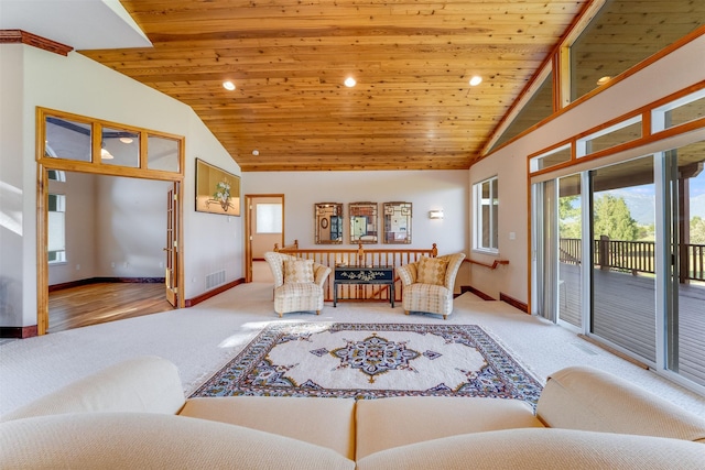 46452 Stagecoach Trl, Ronan, MT 59864 - carpeted living room with lofted ceiling, wood ceiling, and recessed lighting