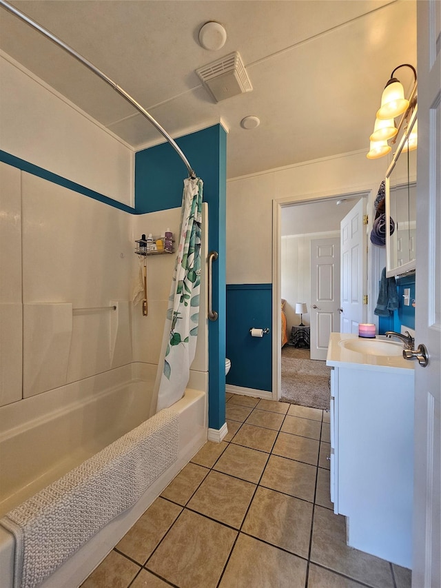 102 E Chilton St, White Sulphur Springs, MT 59645 - full bath featuring shower / bath combo with shower curtain, vanity, and tile patterned floors