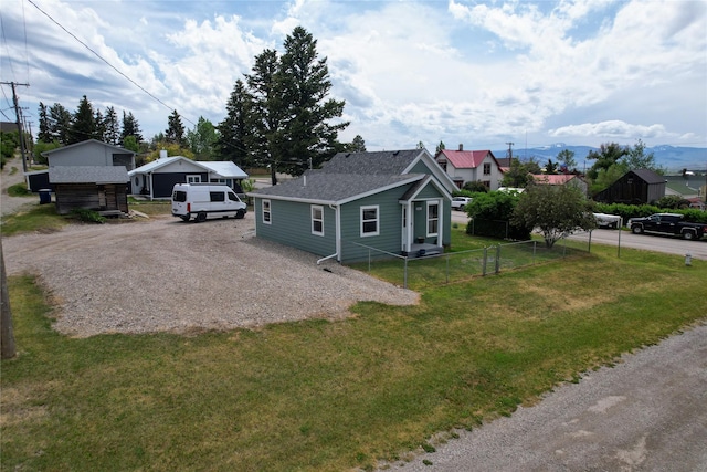 102 E Chilton St, White Sulphur Springs, MT 59645 - view of front of house with driveway and roof with shingles