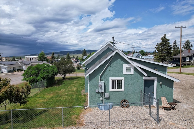 102 E Chilton St, White Sulphur Springs, MT 59645 - view of property exterior with stucco siding