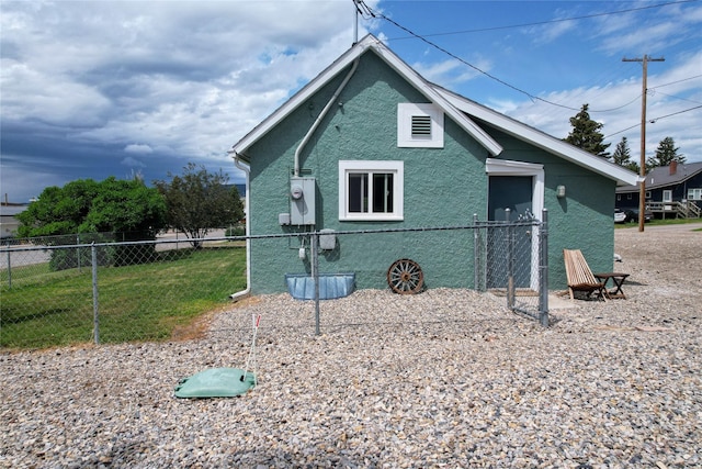 102 E Chilton St, White Sulphur Springs, MT 59645 - view of side of property featuring stucco siding