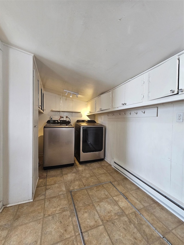 102 E Chilton St, White Sulphur Springs, MT 59645 - laundry room featuring washer and dryer and a baseboard heating unit
