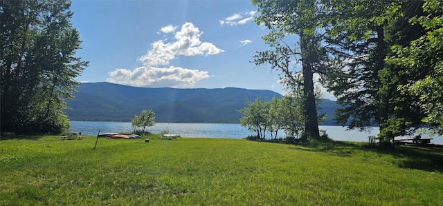 22747 Mt Highway 83, Bigfork, MT 59911 - water view with a mountain backdrop