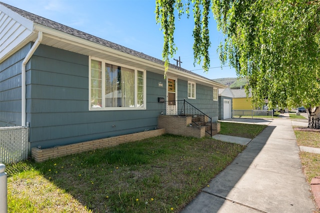 209 Spruce St, Anaconda, MT 59711 - ranch-style house with a garage and driveway