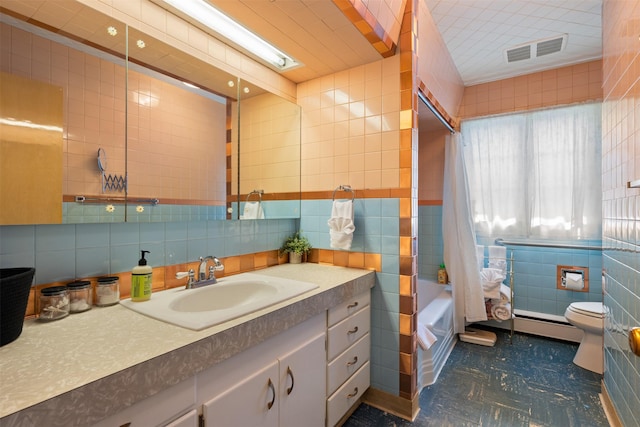 209 Spruce St, Anaconda, MT 59711 - bathroom with tile walls, vanity, shower / bath combination with curtain, and tile patterned floors