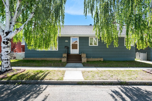 209 Spruce St, Anaconda, MT 59711 - view of front of home with entry steps and roof with shingles