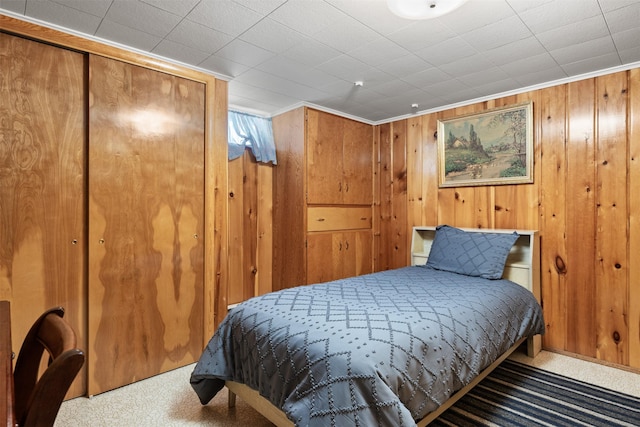 209 Spruce St, Anaconda, MT 59711 - bedroom featuring carpet floors and wood walls