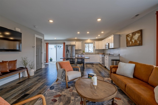 605-607 Leslie Ave, Helena, MT 59601 - living area featuring dark wood-style flooring and recessed lighting