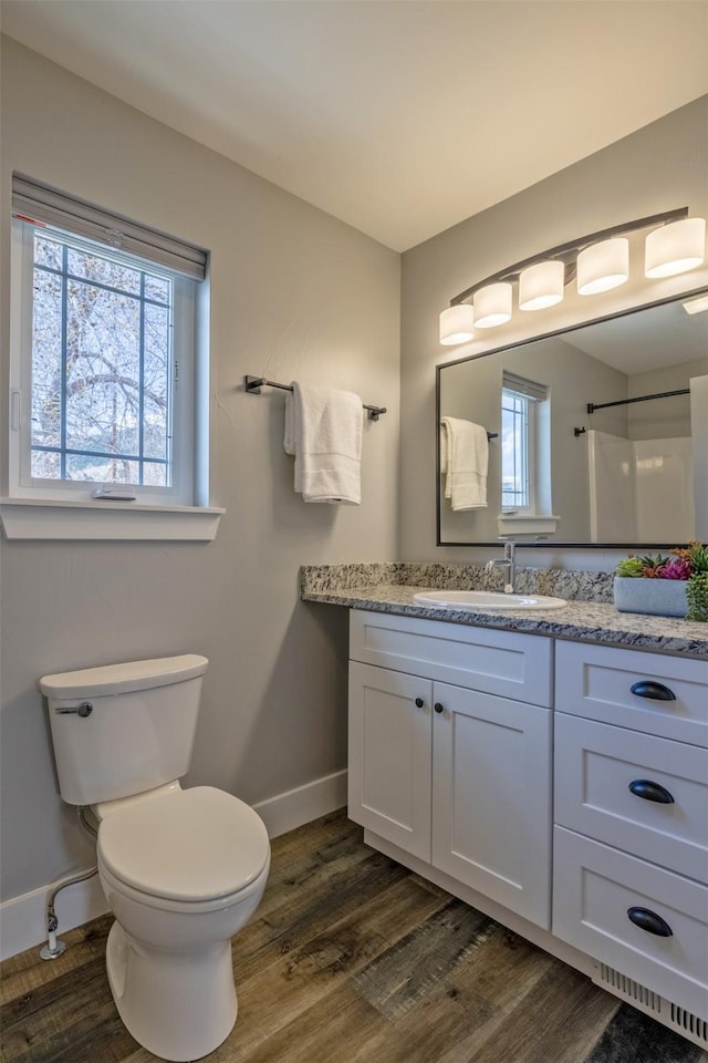 605-607 Leslie Ave, Helena, MT 59601 - bathroom featuring vanity and wood finished floors
