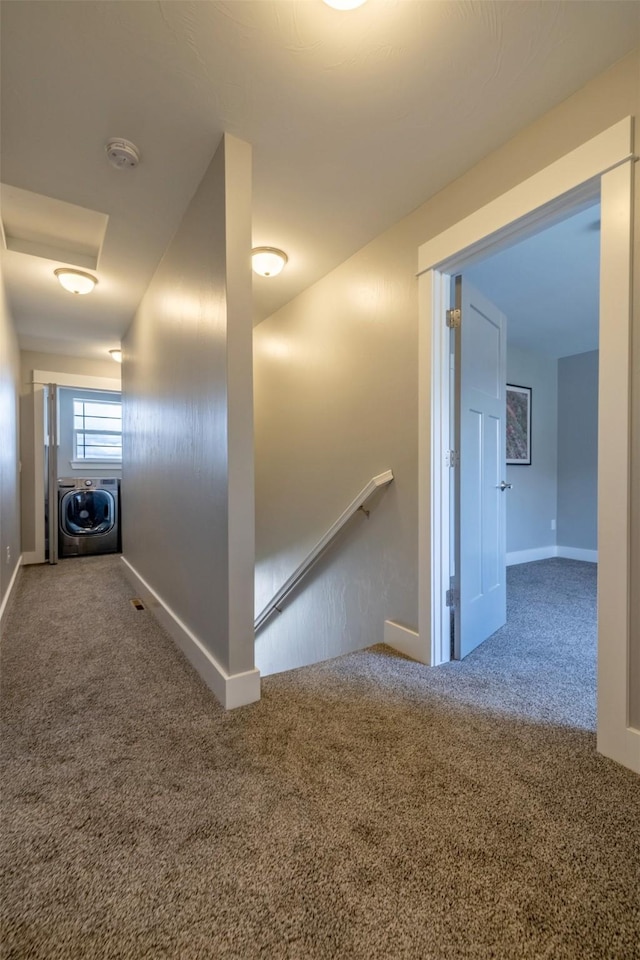 605-607 Leslie Ave, Helena, MT 59601 - corridor with washer / clothes dryer, an upstairs landing, and carpet flooring
