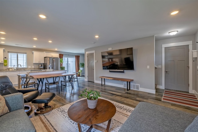 605-607 Leslie Ave, Helena, MT 59601 - living area featuring dark wood finished floors and recessed lighting