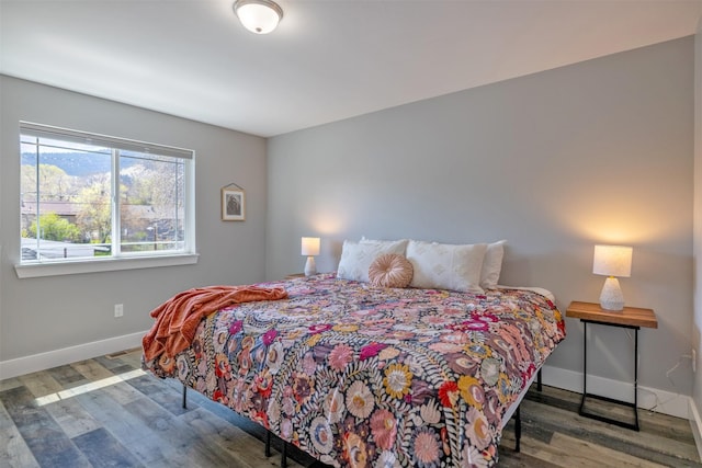 605-607 Leslie Ave, Helena, MT 59601 - bedroom with baseboards and wood finished floors