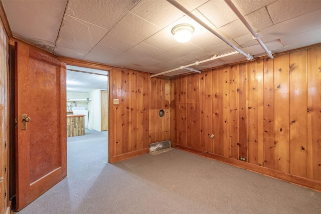 1414 Boulder Ave, Helena, MT 59601 - carpeted spare room featuring washer / clothes dryer and wooden walls