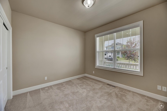 2871 Alexis Ave, Helena, MT 59601 - unfurnished bedroom with light colored carpet and a closet