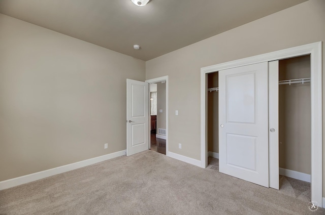 2871 Alexis Ave, Helena, MT 59601 - unfurnished bedroom featuring carpet flooring and a closet