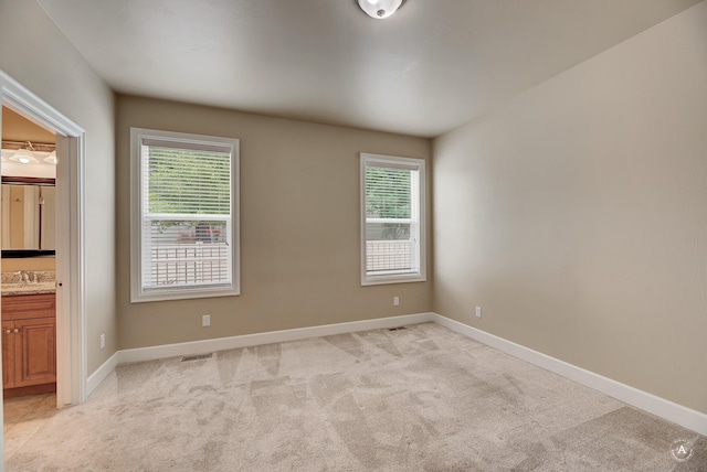 2871 Alexis Ave, Helena, MT 59601 - empty room featuring light colored carpet and a sink