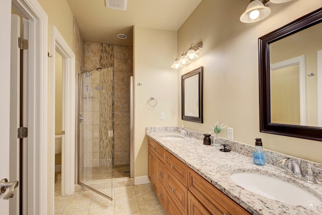 2871 Alexis Ave, Helena, MT 59601 - bathroom featuring a shower stall, double vanity, and tile patterned flooring