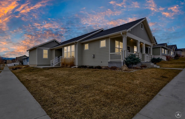 2871 Alexis Ave, Helena, MT 59601 - view of property exterior featuring board and batten siding, a porch, and a yard