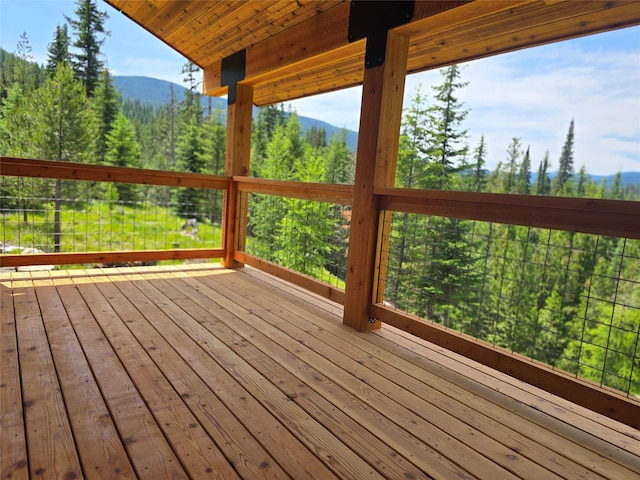 670GUSCREEK Gus Creek Rd, Yaak, MT 59935 - wooden terrace featuring a mountain view
