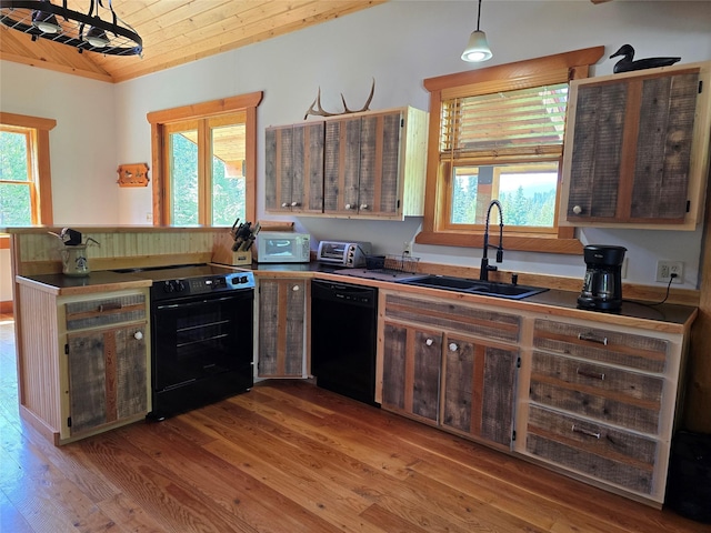 670GUSCREEK Gus Creek Rd, Yaak, MT 59935 - kitchen featuring black appliances, vaulted ceiling, wood finished floors, wooden ceiling, and a peninsula