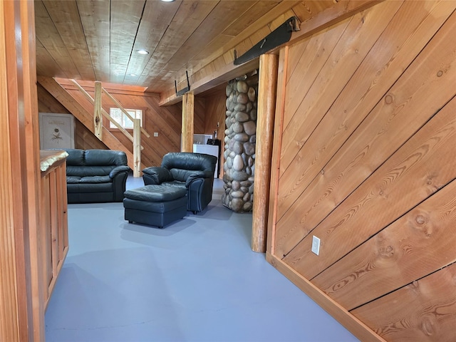 670GUSCREEK Gus Creek Rd, Yaak, MT 59935 - living area with wood walls, finished concrete flooring, and recessed lighting