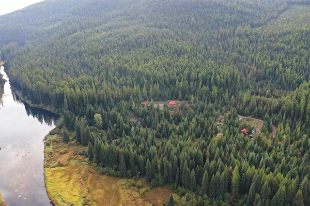 670GUSCREEK Gus Creek Rd, Yaak, MT 59935 - aerial view of property's location featuring a forest and a water and mountain view